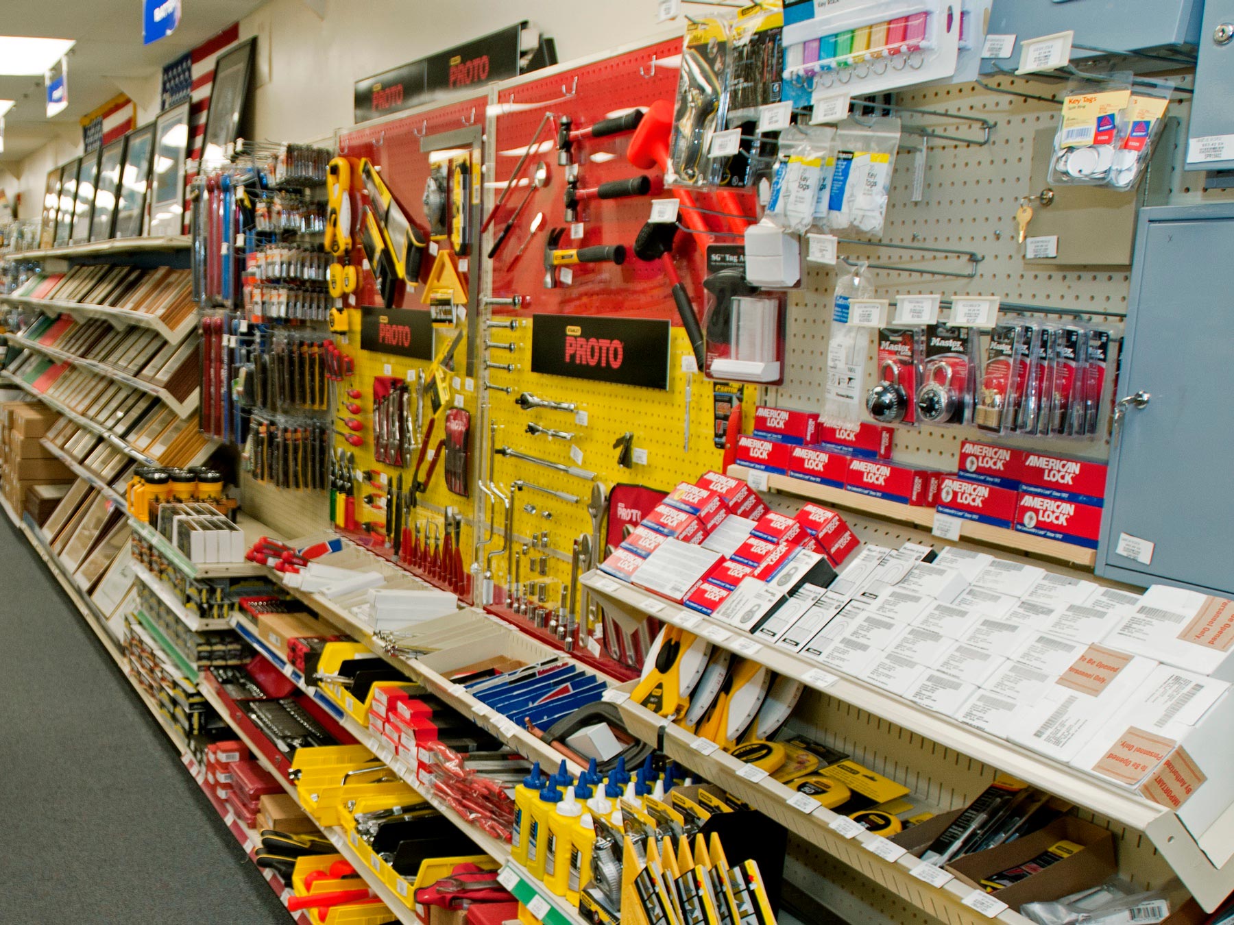 Store isle displaying various tools and office or school supplies